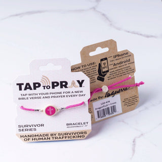 Tap to Pray bracelet with packaging on a white background
