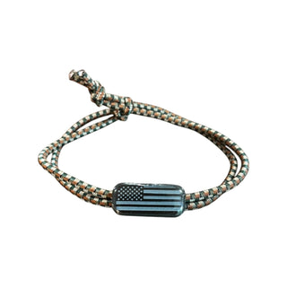Bracelet with American flag charm on a white background