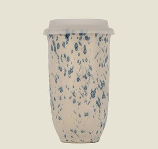 The Wander Sip Mug 16oz in cream with blue speckles